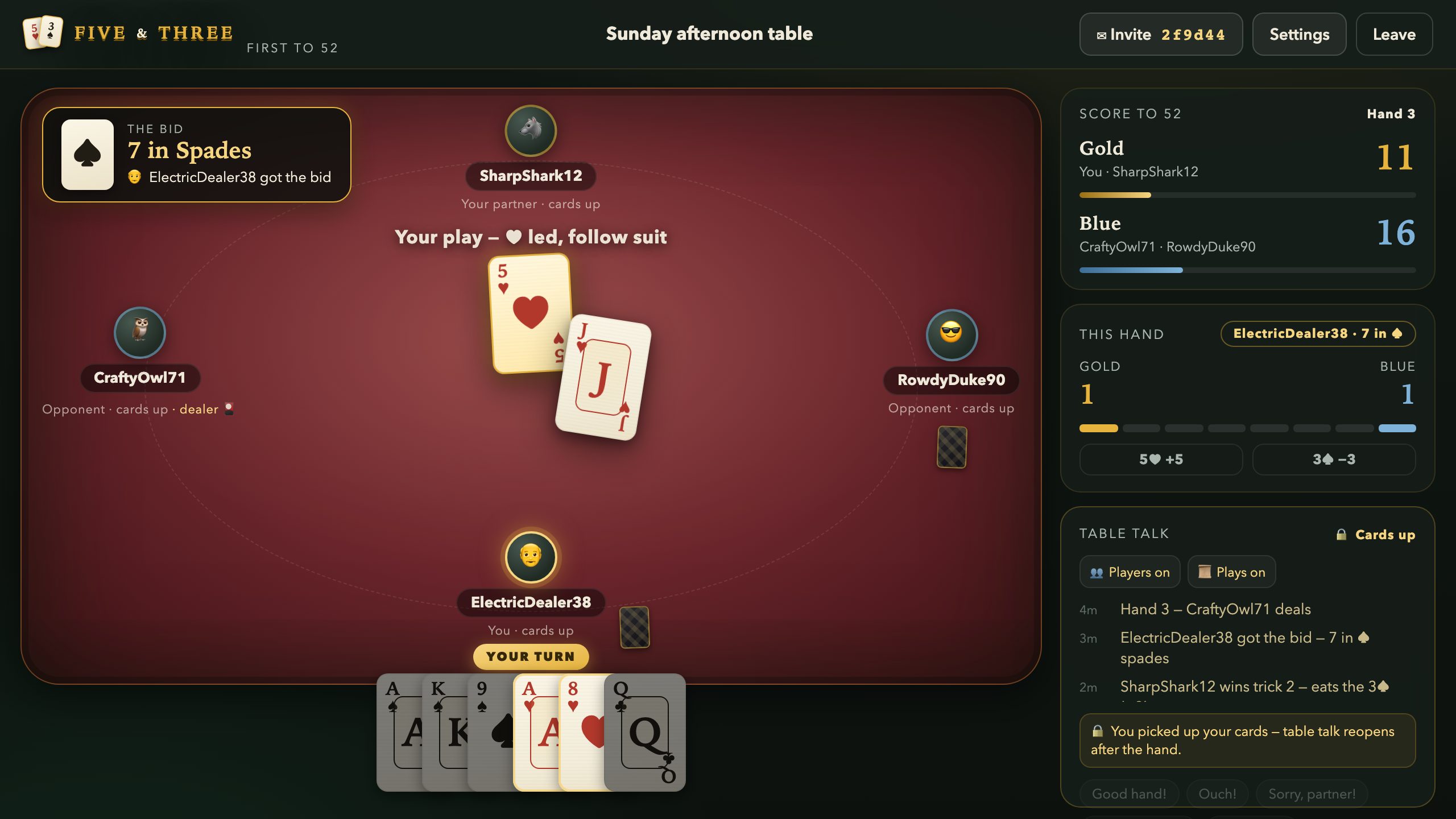 The five of hearts played to the middle of the table